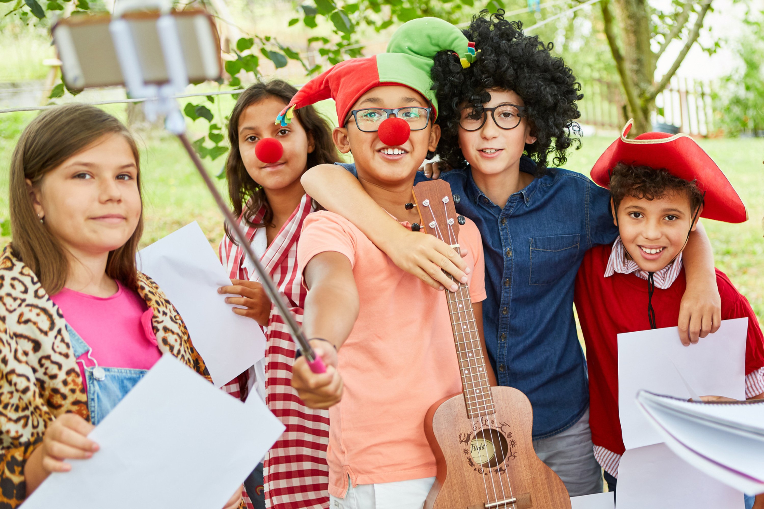 Campers rehearsing for a play and having fun at summer camp