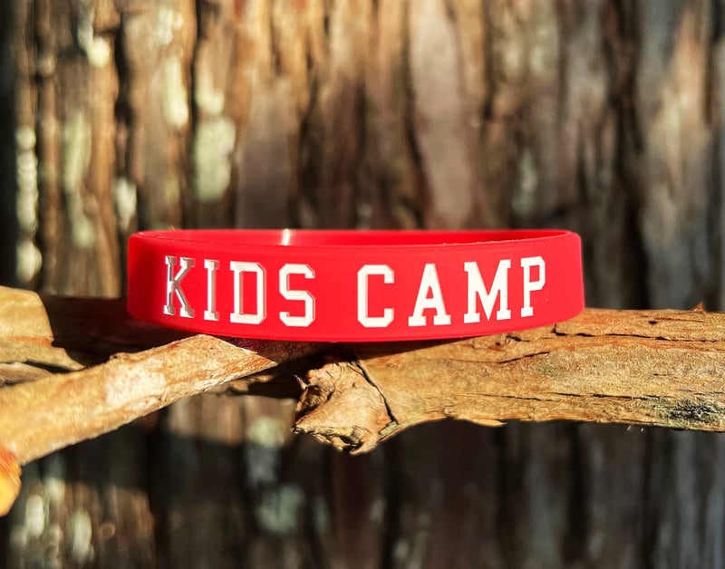 Image of a silicone wristband made for a kids summer camp