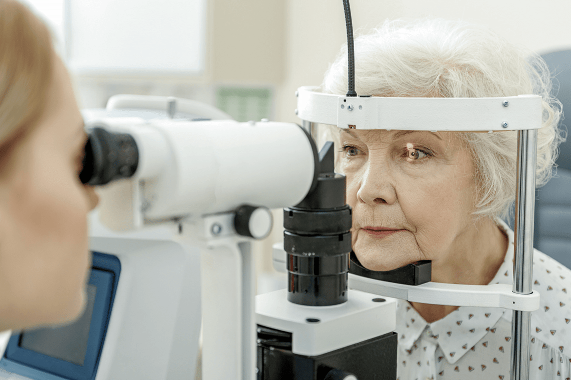 an elderly woman at an eye doctor.