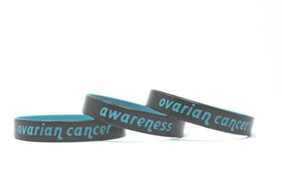 Black and blue color coat wristbands that says ovarian cancer awareness.