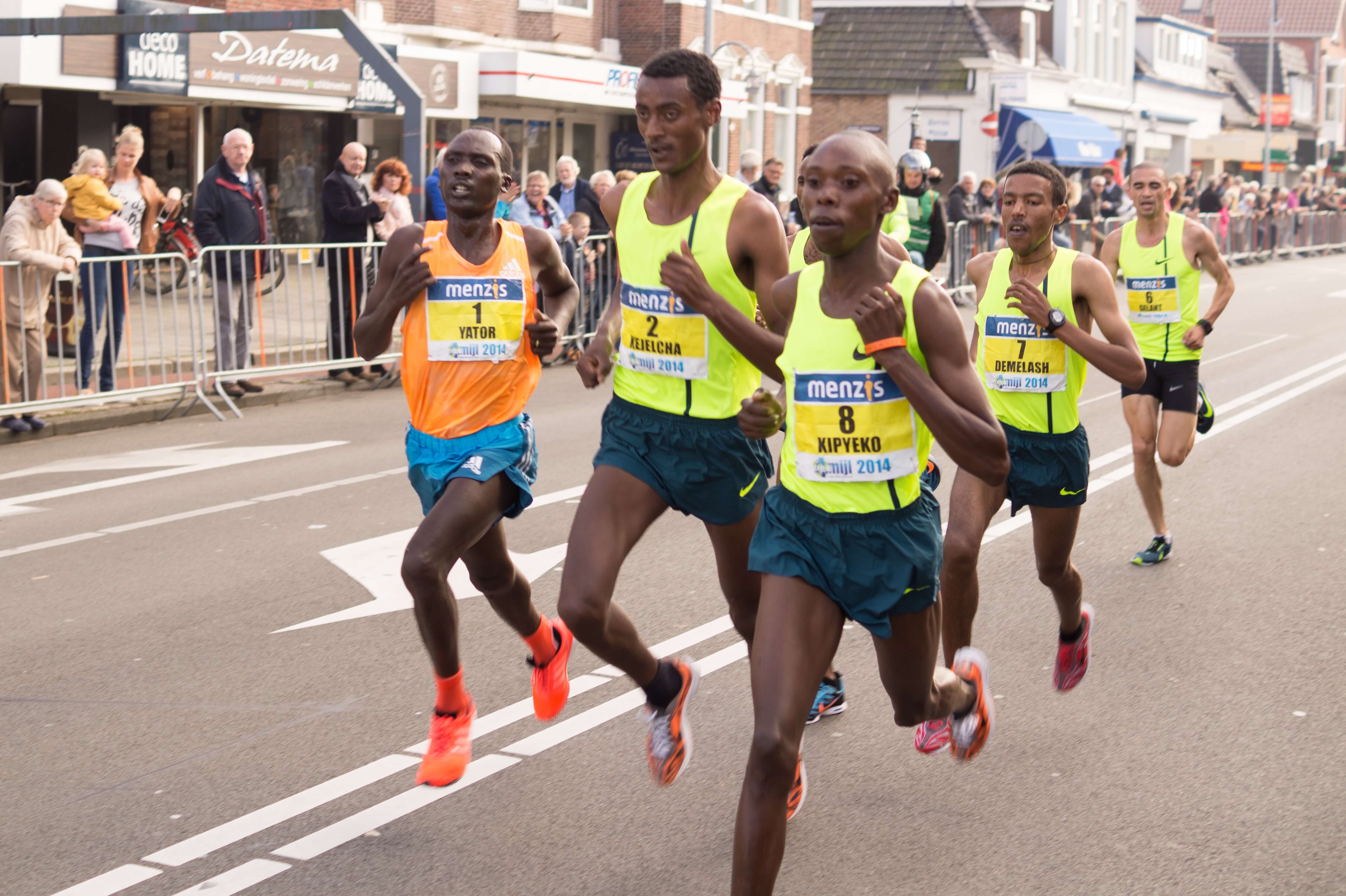 Marathons runners are wearing silicone wristbands.