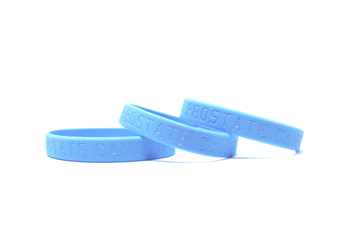 Blue wristbands representing men's health awareness and prostate cancer.