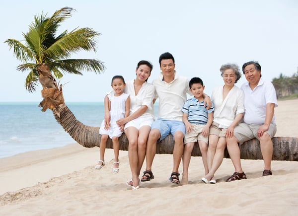 Photo of family member at a family reunion near water