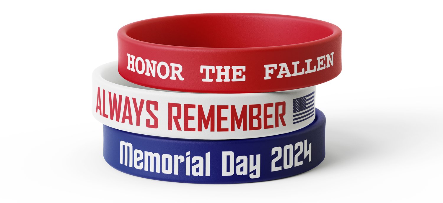 Collection of three silicone wristbands with memorial day related sayings