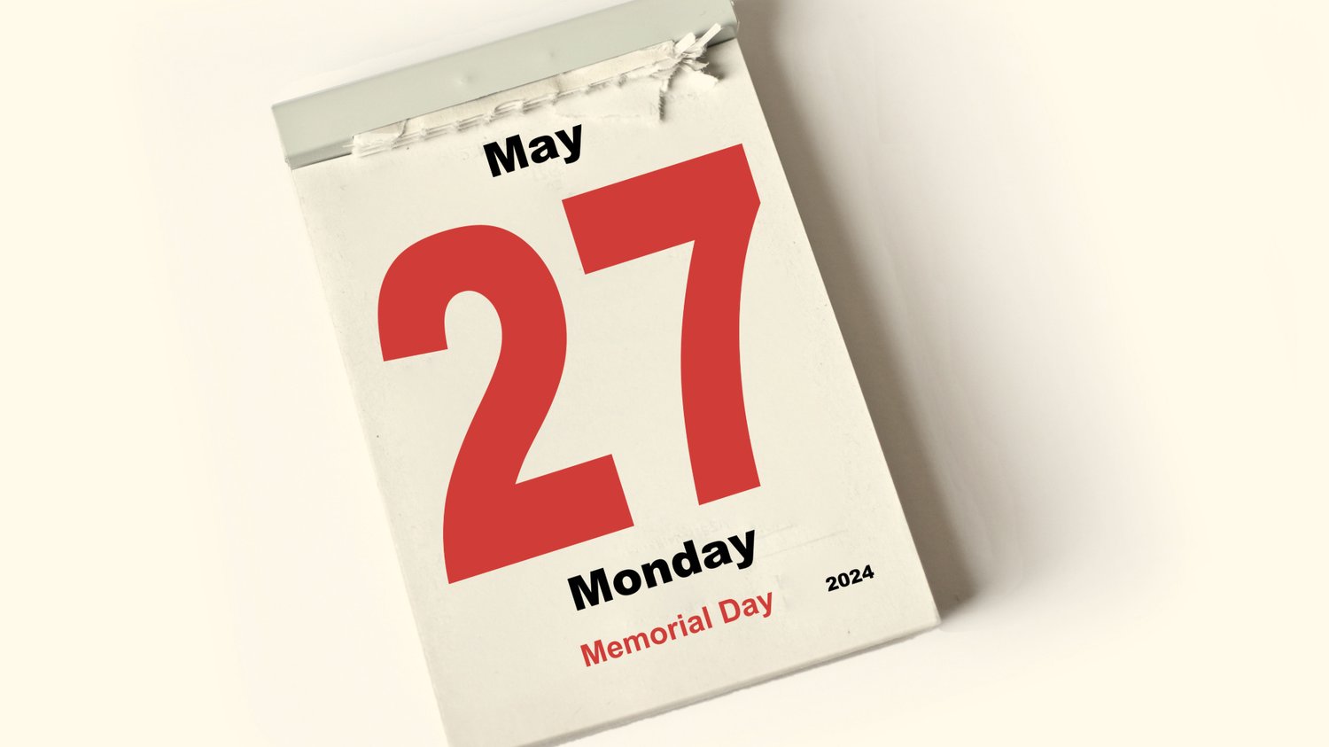 Photo of a daily calendar showing May 27th