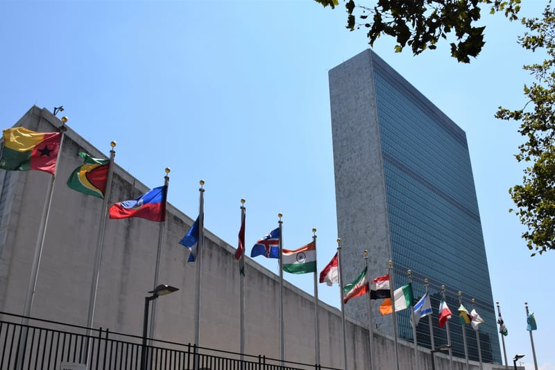Image showing the United Nations building in New York City with international flags outside