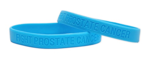 Example photo of a low price customized silicone wristband with a light blue ribbon prostate cancer awareness design to support, raise awareness for, and promote research for prostate cancer.