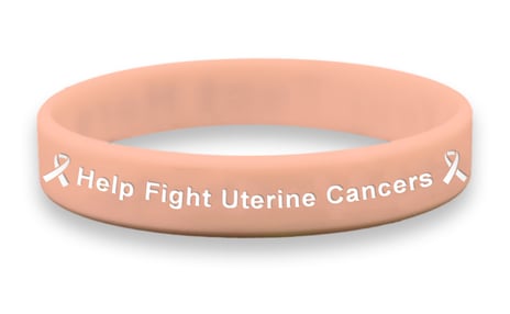 Image showing an example of a wristband with awareness month designs for uterine cancer and endometrial cancer