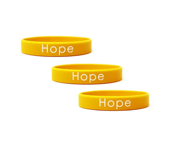 Yellow wristbands saying hope.